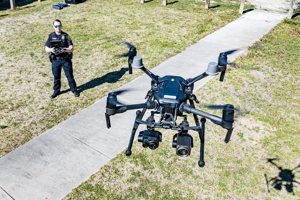 Enterprise drone landing with the pilot standing clear